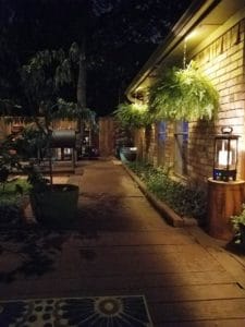 A patio at night lit up by LEDs