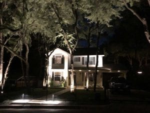 outdoor lighting shining on a home