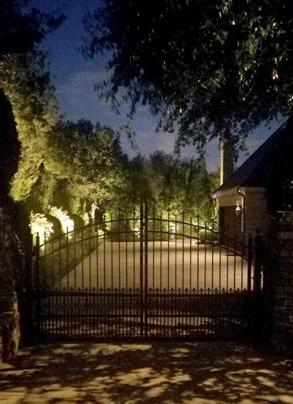security lighting at a driveway gate and outside garage