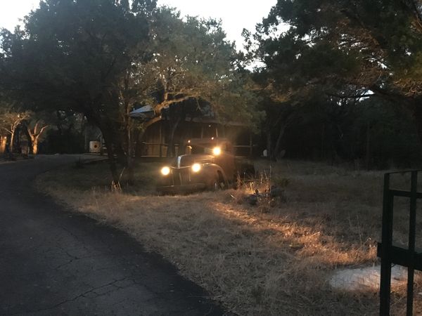 very old and rusty truck with lights